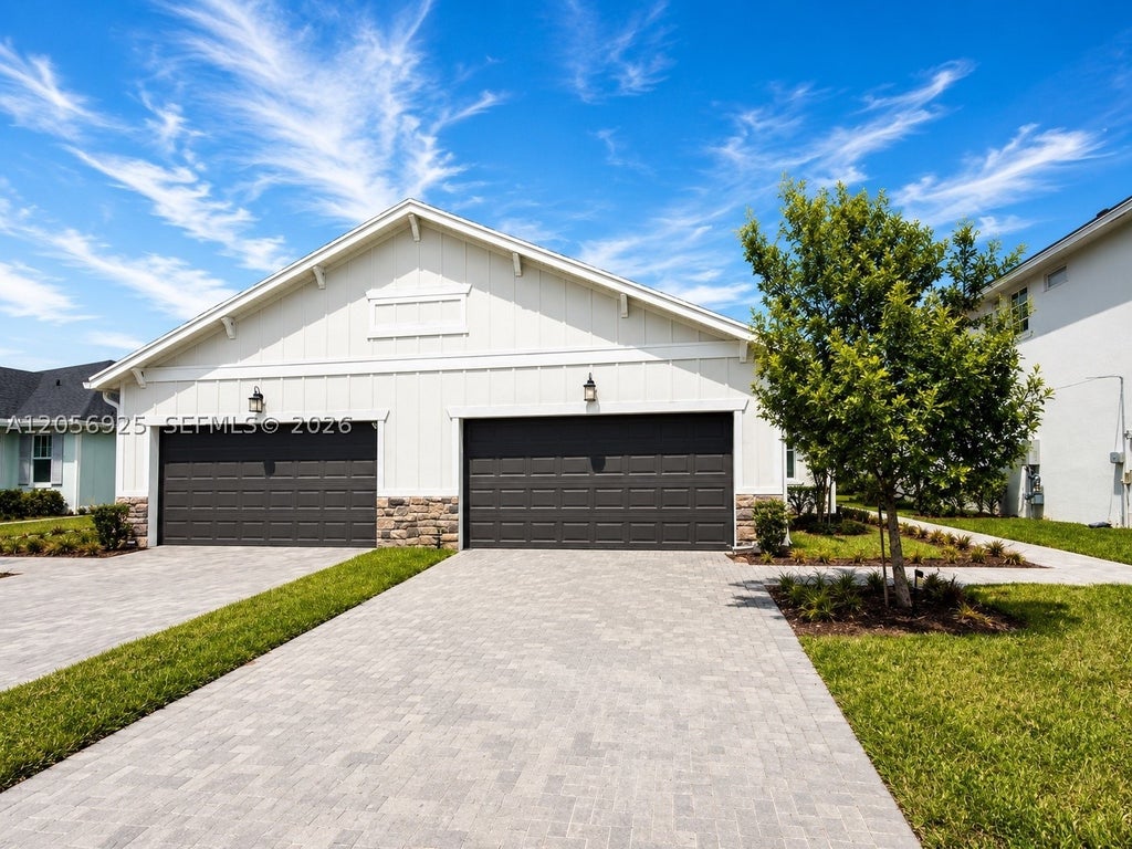 Photo of 1416 Haywagon Trl #1416, Loxahatchee, FL 33470 (MLS # A12056925)