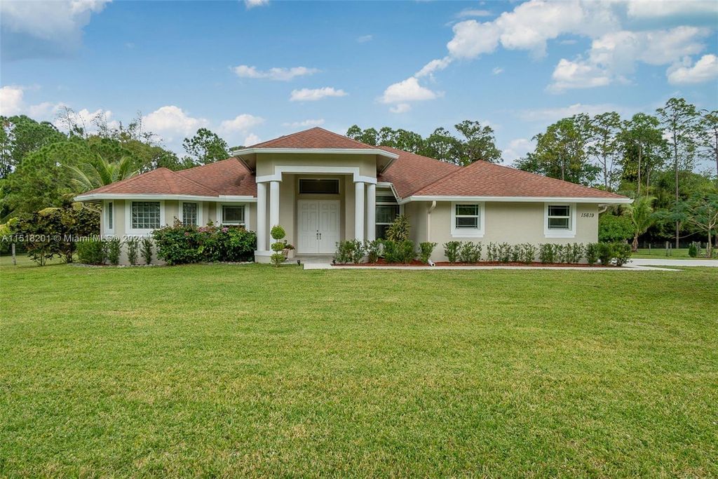 Photo of 15619 N 82nd St N, Loxahatchee, FL 33470 (MLS # A11518201)