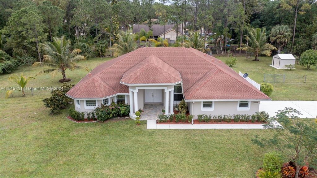 Photo of 15619 N 82nd St N, Loxahatchee, FL 33470 (MLS # A11518201)