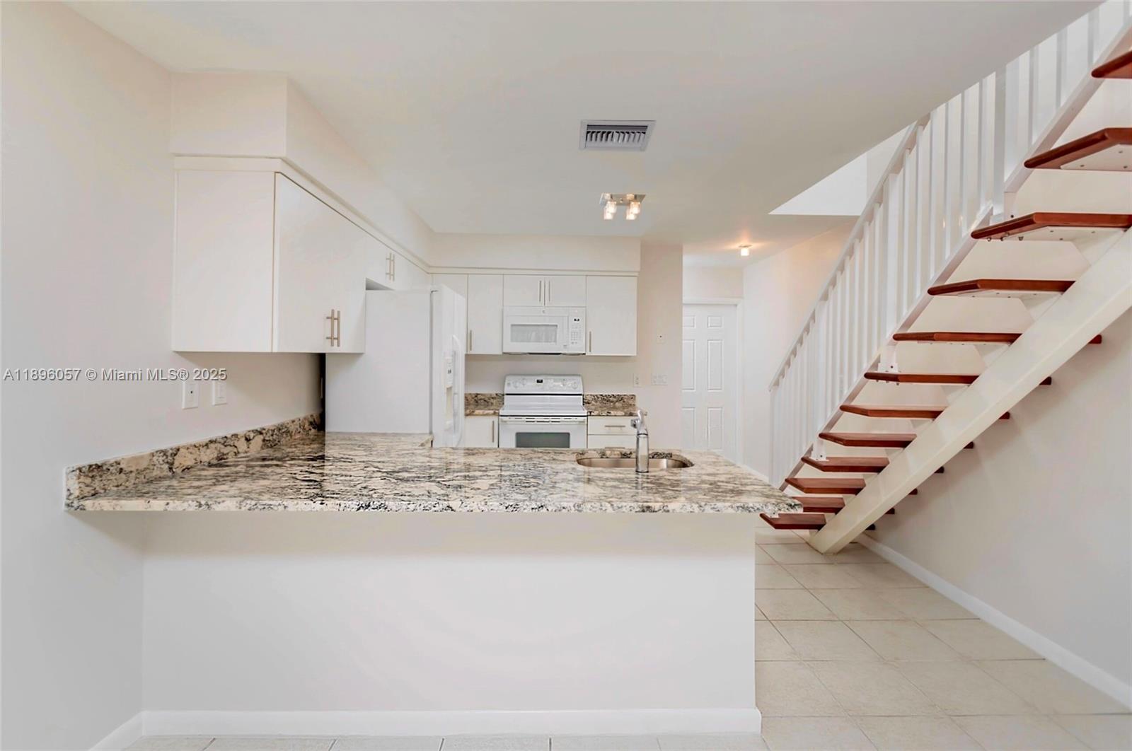 CORAL REEF TOWNHOUSES CON - Residential Lease