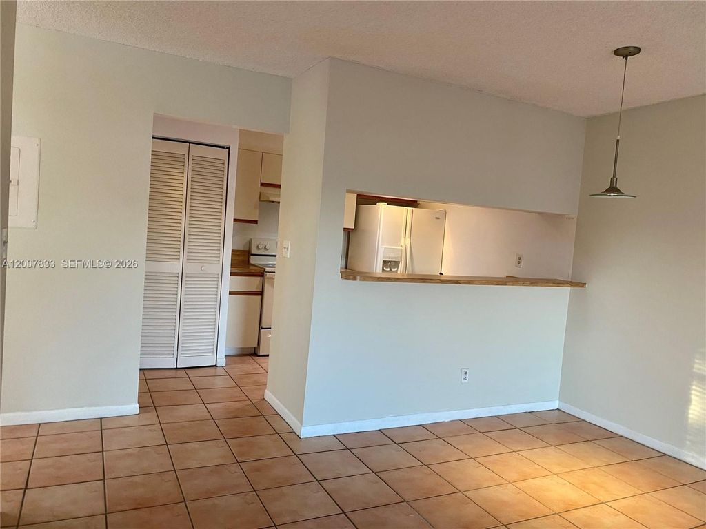 Photo of 11251 SW 13th St #201, Pembroke Pines, FL 33025 (MLS # A12007833)