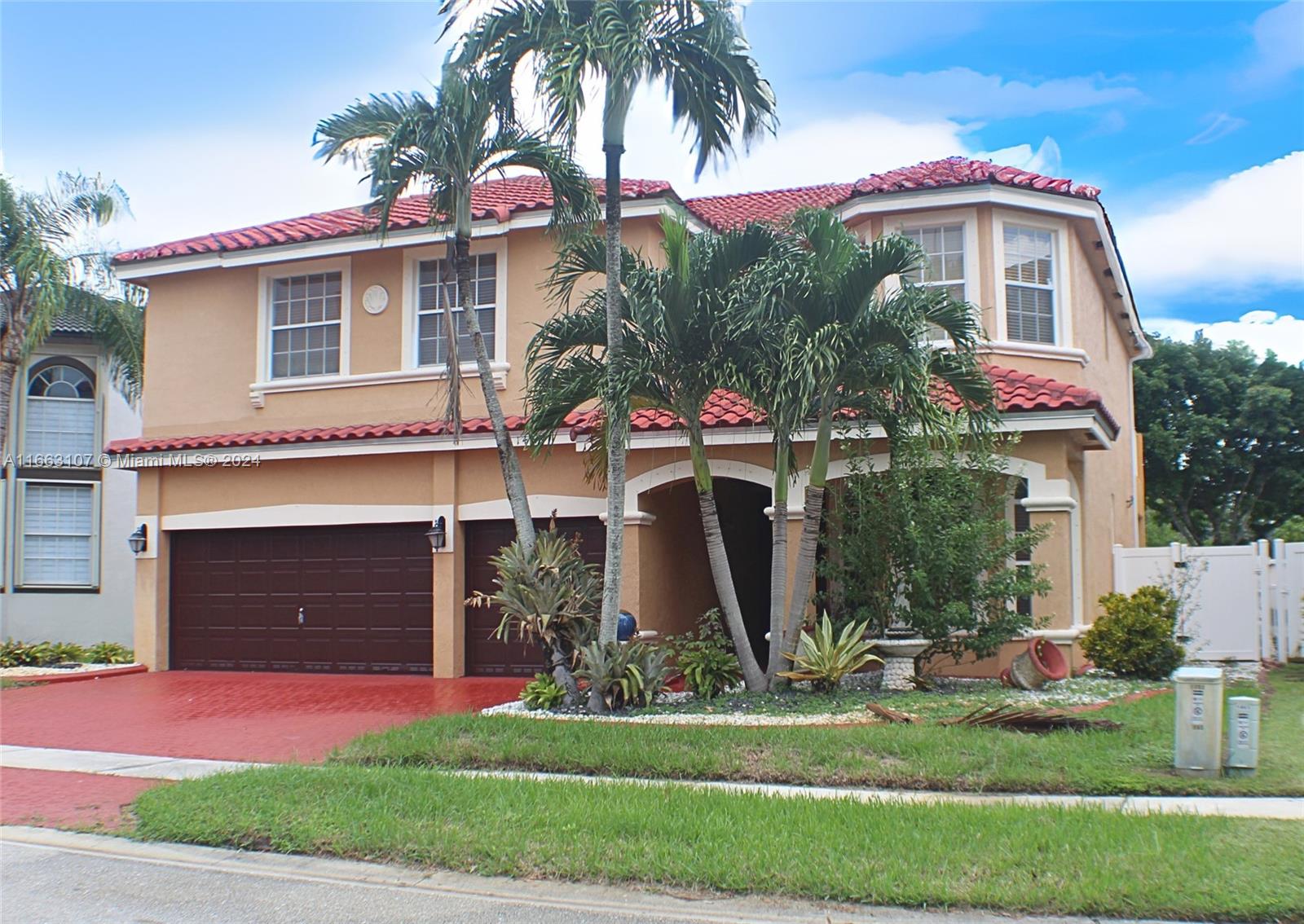 Nestled in the desirable gated community of Pembroke Shores, this spacious 2-story home with 6 bedrooms and 4 full bathrooms is ready for its new owners! The property offers a comfortable living experience with high ceilings and a grand entrance. The first floor includes 1 bedroom and 1 full bathroom, a formal dining area, and an open kitchen with a center island. Upstairs, the primary bedroom features a large tiled terrace overlooking the backyard. The back yard is a blank canvas for new homeowners. Additional conveniences include a separate laundry room with a sink and a 3-car garage. The roof was replaced in 2019, and a new HVAC system was installed in 2020. Located near I-75, parks, golf courses, restaurants, shopping, and schools, this gem is ready to be your next home!