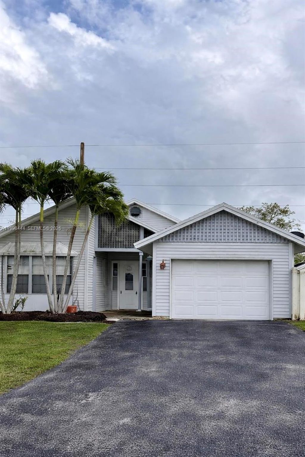 Photo of 9900 NW 44th Ct, Sunrise, FL 33351 (MLS # A11998444)