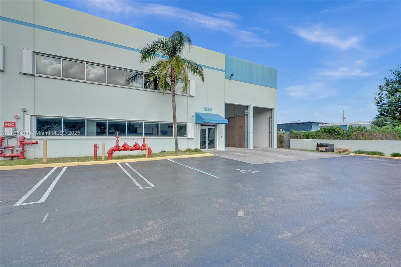 This versatile +/- 11,100 SF warehouse, just minutes from the highway, includes +/- 1,900 SF of office space and +/- 9,200 SF of warehouse space. The first-floor office area includes an ample reception area, and a conference room. The second floor has 2 private offices and additional workspace with restrooms on both floors. The warehouse has 1 office, a kitchen counter/sink, and a restroom. 22' clearance height, 1 ramp & 1 dock door and 2 (24') Refresh overhead fans. There are also multiple steel fences and cage for added security if necessary. This property is well-equipped! Located within a secure gated park with overnight code access.