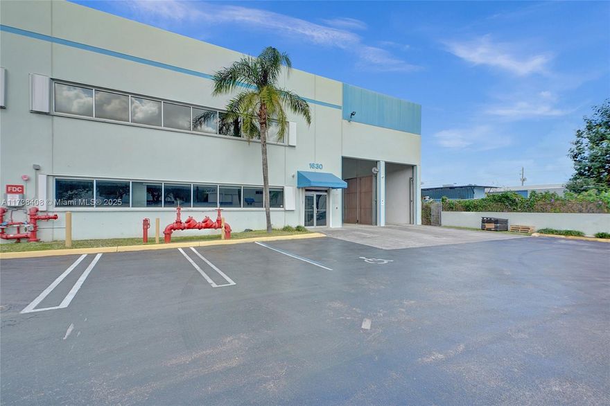 This versatile +/- 11,100 SF warehouse, just minutes from the highway, includes +/- 1,900 SF of office space and +/- 9,200 SF of warehouse space. The first-floor office area includes an ample reception area, and a conference room. The second floor has 2 private offices and additional workspace with restrooms on both floors. The warehouse has 1 office, a kitchen counter/sink, and a restroom. 22' clearance height, 1 ramp & 1 dock door and 2 (24') Refresh overhead fans. There are also multiple steel fences and cage for added security if necessary. This property is well-equipped! Located within a secure gated park with overnight code access.