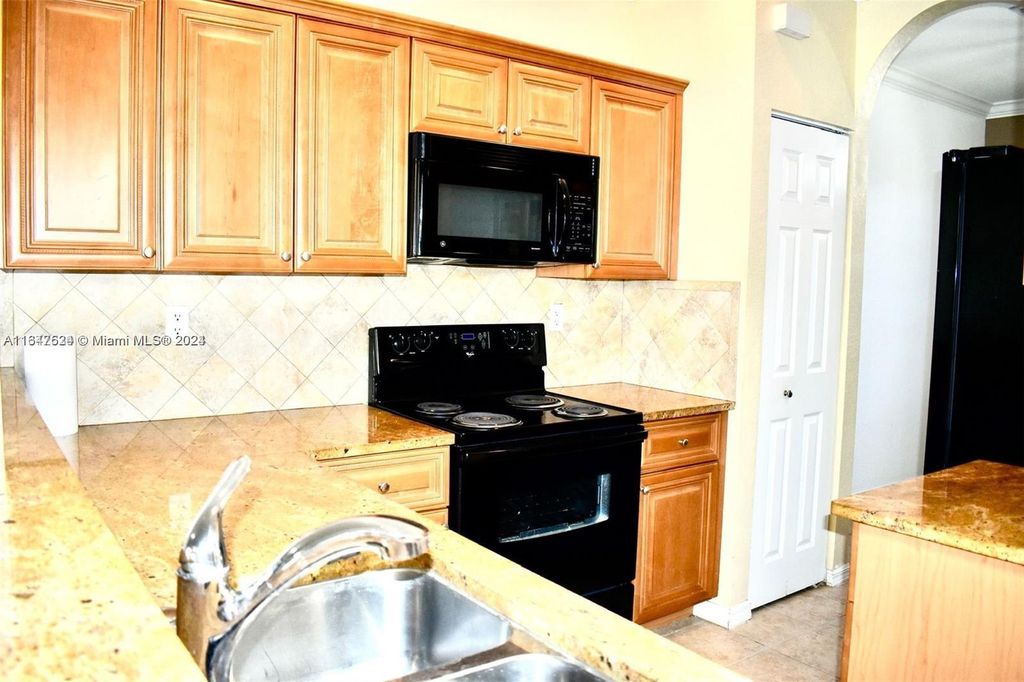 Photo of 6037 SW 19th Ct #6037, North Lauderdale, FL 33068 (MLS # A11647524)