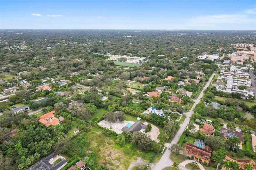 Nestled within Miami's sought-after 33156 zip code, your Private Oasis awaits you.  Spanning 1.16 acres, the residence offers a harmonious blend of sophistication and tranquility. Step into your secluded haven, with manicured grounds, a private beach, saltwater pool, and Koi pond creating a Zen atmosphere. The open-air floor plan encompasses 3,548 square feet of living space, seamlessly connecting indoor and outdoor areas that flood with natural light. The large primary suite has a hotel-like feel equipped with a large closet which was originally a 4th bedroom. 3 bed/3.5 baths, this residence caters to both family and guests. Perfectly located near top private schools, major highways, and the vibrant amenities of Miami, invites you to experience the pinnacle of luxurious living.