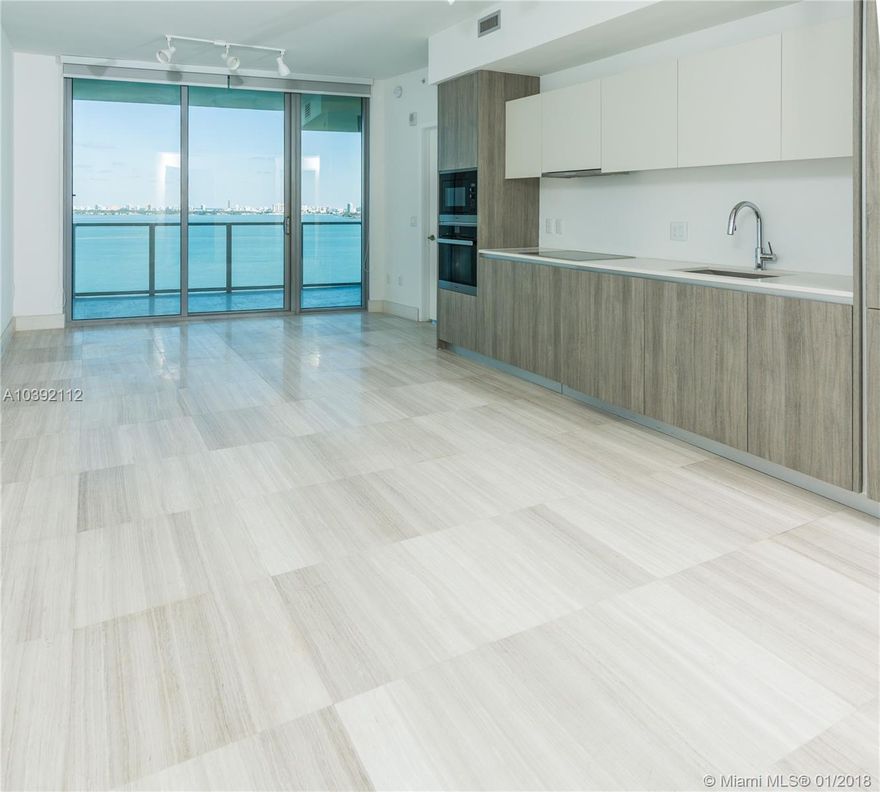 Enjoy pleasant views of Biscayne Bay from the extraordinary Biscayne Beach Condo. This beautiful unit features European finishes and fixtures, floor-to-ceiling windows and top of the line appliances. This residence and amenities offers an exceptional resort-style living experience, where includes swimming pools, tennis courts, business centers, spa, lounges, fitness center, beach club with a volleyball court, cabanas and beach lounge with fire pits. 
1 Bed + Den / 2 Bath A/C: 983 SqFt Terrace: 114 SqFt Total 1,097 SqFt
