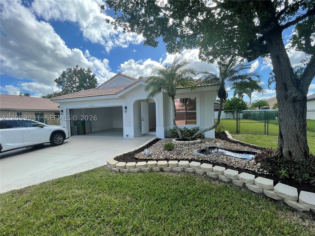 Photo of 16232 SW 10th St, Pembroke Pines, FL 33027 (MLS # A12099031)