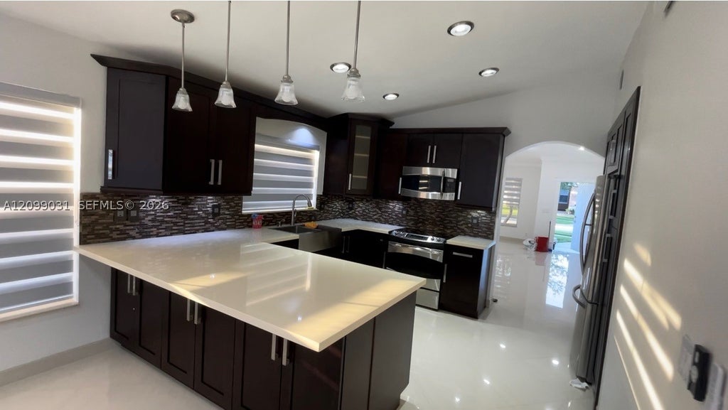 Photo of 16232 SW 10th St, Pembroke Pines, FL 33027 (MLS # A12099031)