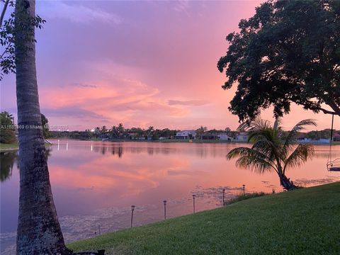 Photo of 1324 NW 126th Ave, Sunrise, FL 33323 (MLS # A11881369)