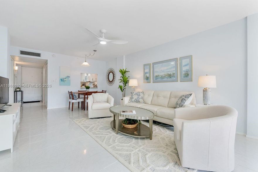 STILL THE BEST VALUE IN ALL OF ROYAL PARK — Unmatched price, updates, and condition! Welcome to this beautifully updated 2BR/2BA second-floor residence offering an open, light-filled layout in the sought-after, gated, Royal Palm Acres neighborhood. This standout unit features impact windows, a tankless water heater, updated bathrooms, and a modern kitchen with newer appliances — including a refrigerator under 2 years old and dishwasher under 5 years old. Both spacious bedrooms offer private, en-suite bathrooms and walk-in closets for added comfort and functionality. Step out onto your screened balcony and enjoy peaceful canal views — the perfect setting for morning coffee or evening relaxation. This inviting space is amazing for everyday living and entertaining. Deeded parking plus guest parking allows for two vehicles, a valuable and rare convenience. Royal Park is a pet-friendly, gated community with resort-style amenities including pool, fitness center, and beautifully maintained grounds — plus fully funded reserves for added peace of mind. Ideally located next to Easterlin Park with acres of trails, and just minutes to shopping, dining, and major roadways. If you’ve been waiting for the best opportunity in Royal Park — this is it.