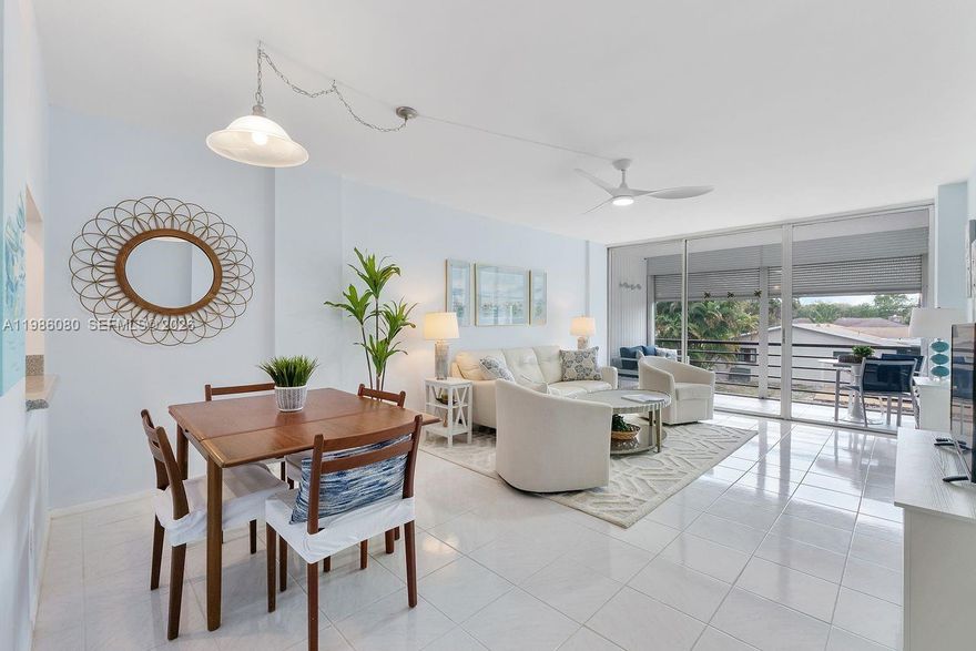 BEST VALUE IN ALL OF ROYAL PARK — Unmatched price, updates, and condition! Welcome to this beautifully updated 2BR/2BA second-floor residence offering an open, light-filled layout in the sought-after, gated, Royal Palm Acres neighborhood. This standout unit features impact windows, a tankless water heater, updated bathrooms, and a modern kitchen with newer appliances — including a refrigerator under 2 years old and dishwasher under 5 years old. Both spacious bedrooms offer private, en-suite bathrooms and walk-in closets for added comfort and functionality. Step out onto your screened balcony and enjoy peaceful canal views — the perfect setting for morning coffee or evening relaxation. This inviting space is amazing for everyday living and entertaining. Deeded parking plus guest parking allows for two vehicles, a valuable and rare convenience. Royal Park is a pet-friendly, gated community with resort-style amenities including pool, fitness center, and beautifully maintained grounds — plus fully funded reserves for added peace of mind. Ideally located next to Easterlin Park with acres of trails, and just minutes to shopping, dining, and major roadways. If you’ve been waiting for the best opportunity in Royal Park — this is it.