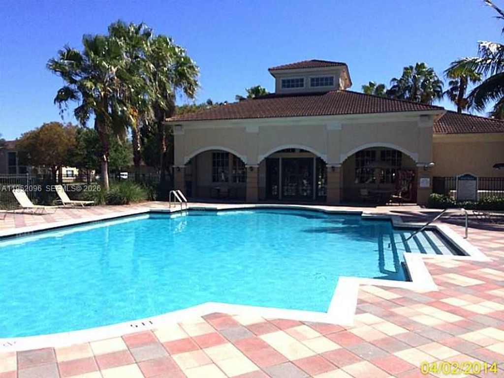 Photo of 2541 Centergate Dr #101, Miramar, FL 33025 (MLS # A11952096)