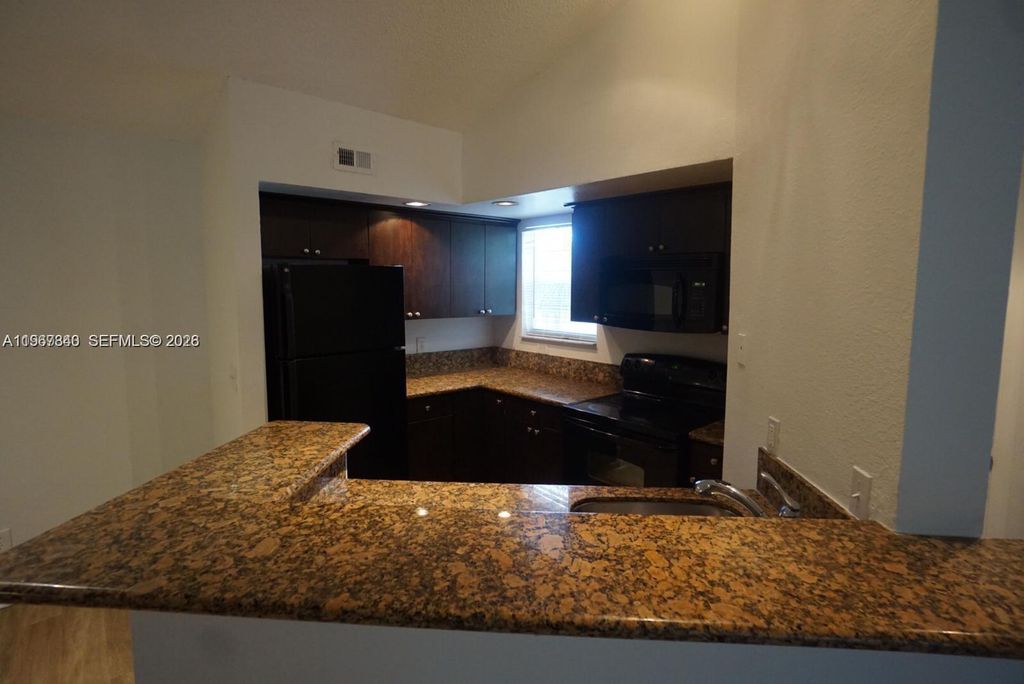 Photo of 12840 Vista Isles Dr #628, Sunrise, FL 33325 (MLS # A11967340)