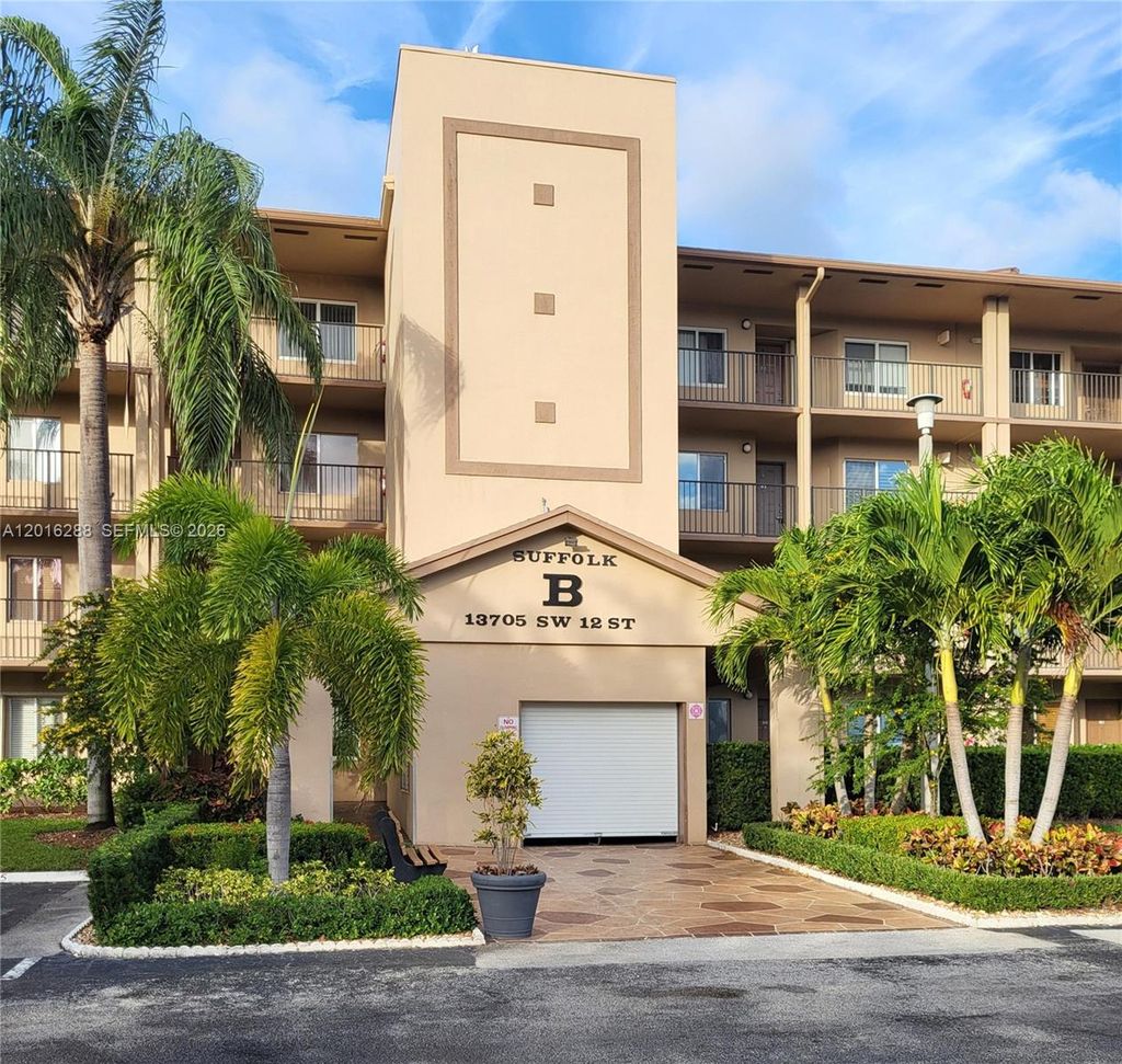 Photo of 13705 SW 12th St #304B, Pembroke Pines, FL 33027 (MLS # A12016288)
