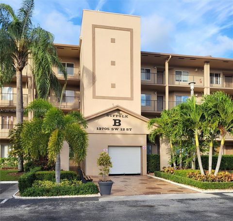Photo of 13705 SW 12th St #304B, Pembroke Pines, FL 33027 (MLS # A12016288)