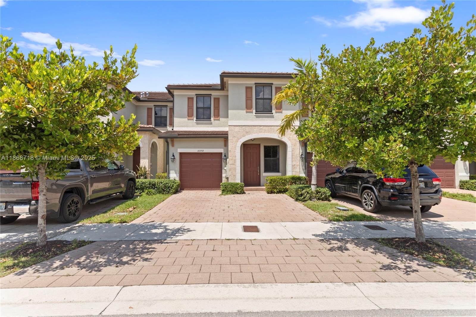 3/3 townhome at the Aquabella community of West Hialeah. Perfect for starter families, this modern home features an open-concept layout, stainless steel appliances, and in-unit washer and dryer. Enjoy your private fenced backyard or take advantage of resort-style amenities, including two clubhouses, pools, splash park, fitness center, and game room. The community is very kid-friendly, with plenty of space to play, and ideally located near top-rated schools, shopping, and major highways (I-75, Turnpike, Palmetto). A fantastic opportunity to live in a welcoming, family-oriented neighborhood. Move-in ready!