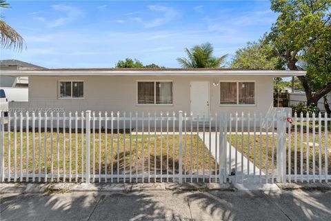 Photo of 8400 NW 24th Ct, Miami, FL 33147 (MLS # A12017385)