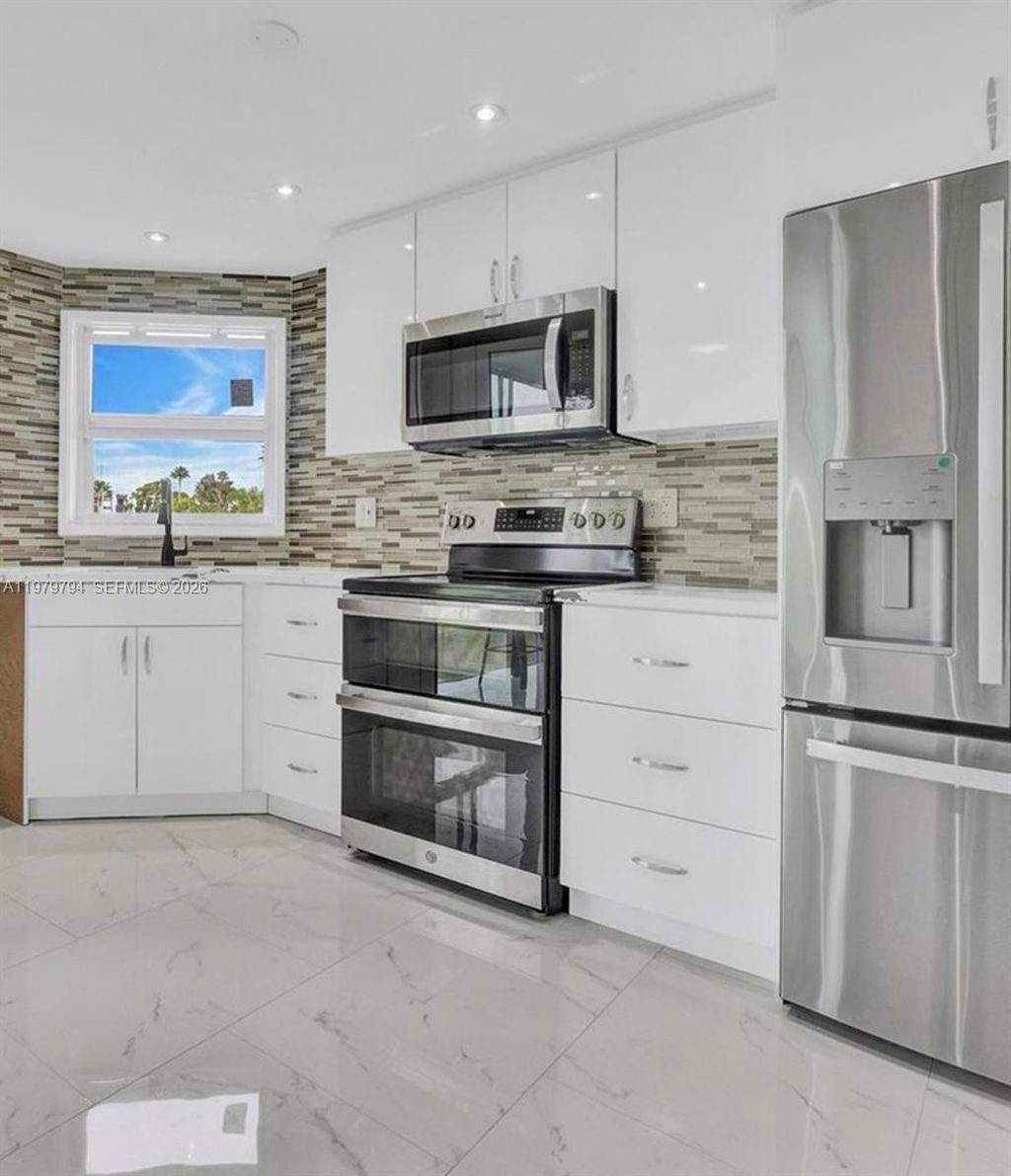 Photo of 3661 Via Poinciana #206, Lake Worth, FL 33467 (MLS # A11979794)