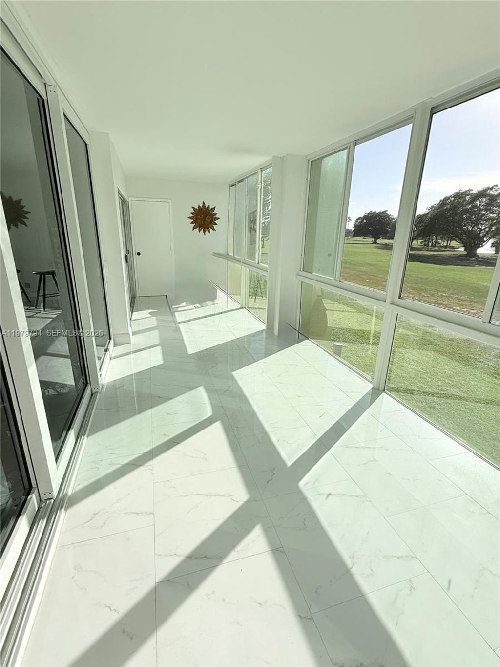 Photo of 3661 Via Poinciana #206, Lake Worth, FL 33467 (MLS # A11979794)