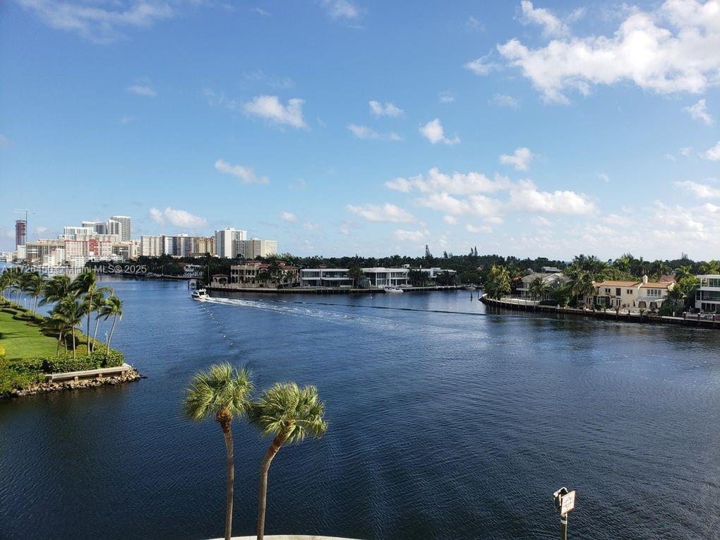Experience the ultimate in luxury living on Aventura’s prestigious Country Club Drive! This unit features a magnificent water view that feels like being on a yacht, with 2 open balconies offering incredible views. The interior boasts an open kitchen, tiled wood floors, and the convenience of an in-unit washer and dryer. High-speed internet and basic cable are included for added ease. The building offers amenities, including a library room, billiard room, gym, and 1 assigned parking spot. Don’t miss the opportunity to enjoy this exceptional lifestyle—schedule your showing today!