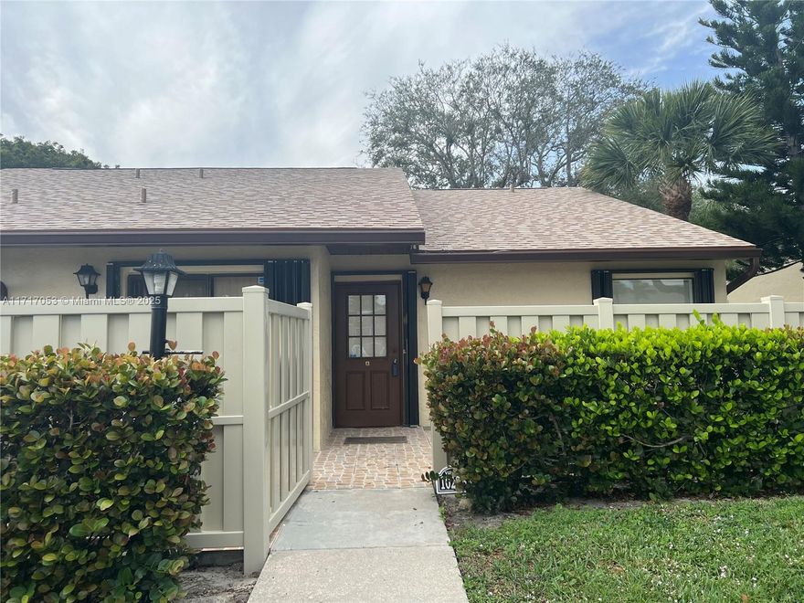 Beautiful lake  View, end unit  Villa in the Palm Club of West Palm Beach, 2 bedroom/2bath , large living area with covered Patio.  . No carpet , nice tile. Accordion Shutters are  on all doors and windows.