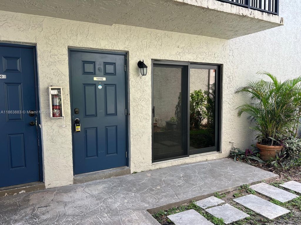 Photo of 10592 Royal Palm Blvd #10592, Coral Springs, FL 33065 (MLS # A11863883)