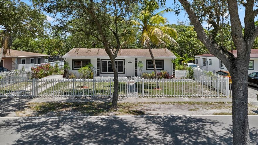 Welcome to this charming 3BR/1.5BA single-family home offering over 1,500+ SF of living space, a spacious layout, and endless potential. Interior features a functional flow with tasteful updates throughout, including wall panel accents in the dining area and a partially renovated interior. The kitchen offers cabinetry, laminate countertops, and brand-new stainless steel appliances. A rare Florida room/den adds extra flexibility for entertaining, relaxing, or creating a home office space. Major updates include a 2019 roof, brand-new A/C system, new electrical water heater, and full hurricane impact windows providing comfort, efficiency, and peace of mind. Exterior features include a fenced yard with gated access and driveway parking. Centrally located in the North Miami area with quick access to I-95, State Road 7, shopping, dining, parks, and schools. Sold strictly AS-IS!