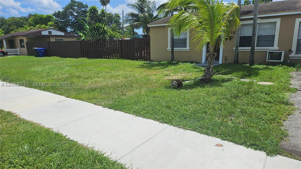 Photo of 6118 Plunkett St #1, Hollywood, FL 33023 (MLS # A12062772)