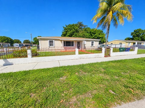 Photo of 15600 NW 28th Ct, Miami Gardens, FL 33054 (MLS # A12097926)