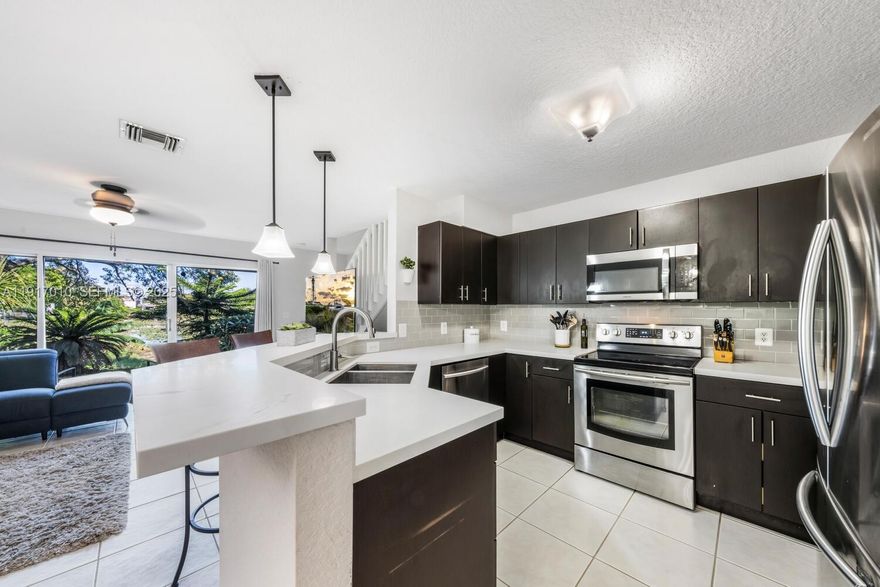 Come home to a peaceful water view that you can enjoy from the inside or outside. Wonderful 3/2.5 with a one car garage with newer opener and springs! Downstairs features a guest bath for your entertaining needs. Under the stair storage. Beautiful tile floors that compliment the the wood cabinets and quartz counters in the kitchen! Upstairs a spacious owners room and private bath with a roman tub and dual sinks. Two front facing bedrooms that are accented with luxury vinyl wood look floors. Great location for comuting or enjoying nearby city events! Association fee does not include homeowners insurance. Owner currently pays approximately $278/mo. See Attachments for Details and Offers.