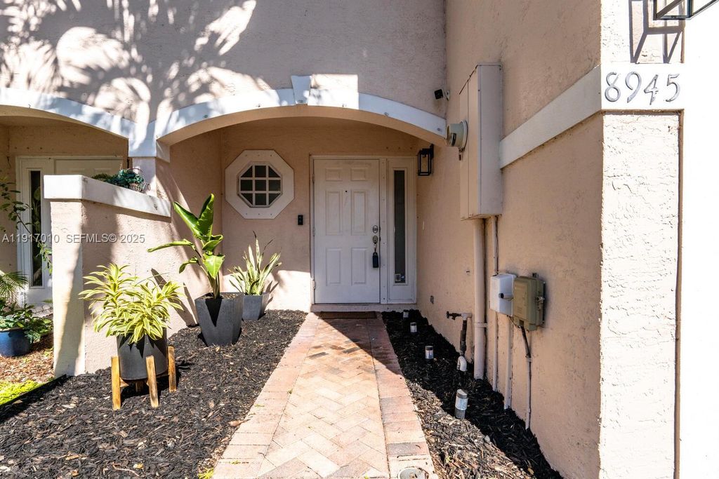 Photo of 8945 NW 38th Dr #17, Coral Springs, FL 33065 (MLS # A11917010)