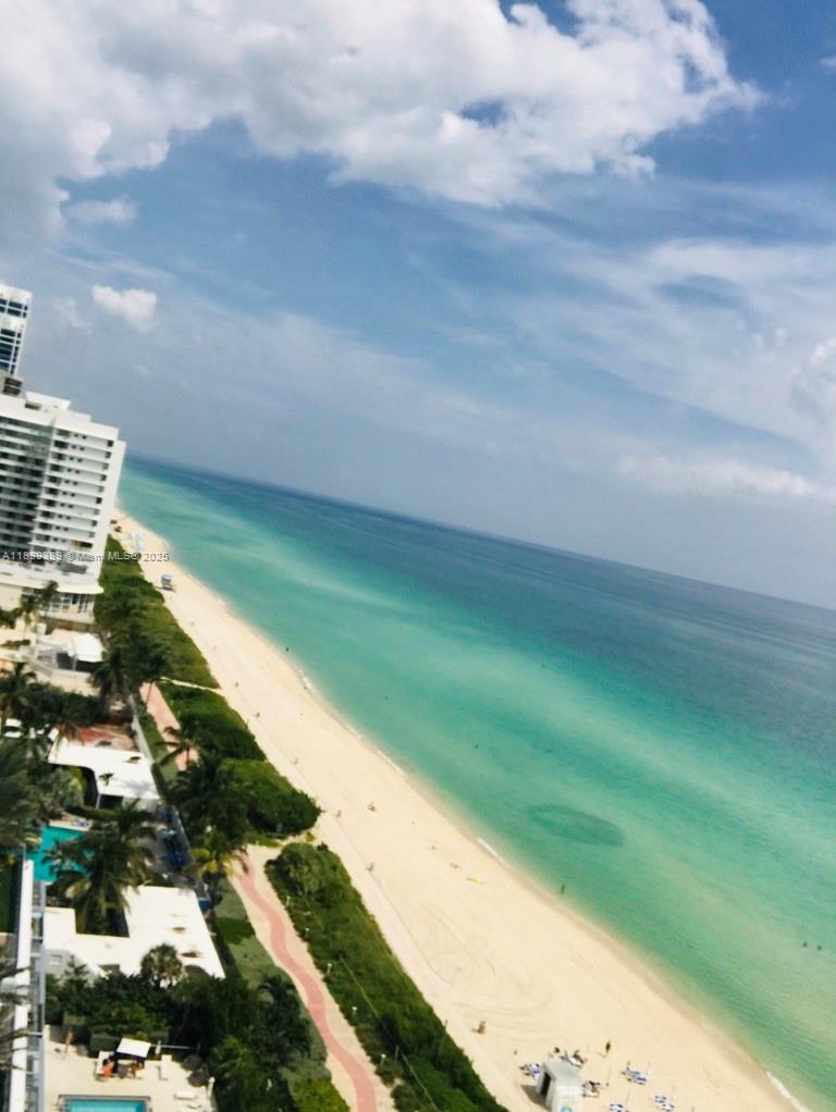 Amazing Beachfront Apartment "180 ocean view" encompasses approximately half of the horizon, offering a sweeping view of the Atlantic Ocean and the coastlineA heated swimming pool and recreation area both offer expansive water views. include a billiard room, theater room, business center with conference room, 24-hour concierge, and a complete fitness center. Kitchen with Italian cabinetry, 2 private balconies, stainless steel appliances, and open floor plans. this 2004 development has 129 units.