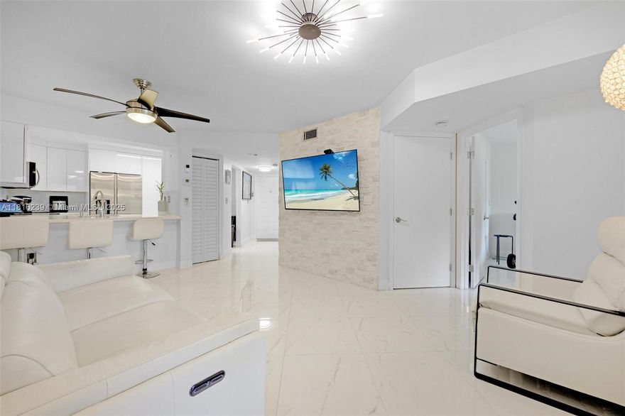 Welcome to the heart of Miami Lakes! This beautifully renovated 2-bedroom, 1.5-bath condo in the scenic Celebration Point community offers 850 sq ft of comfortable living space with serene water views. Enjoy your private screened patio and an open floor plan featuring tile floors throughout, updated bathrooms, and a modern kitchen equipped with new stainless steel appliances.
This home includes convenient in-unit washer and dryer, new ceiling, thermostat, light fixtures, ceiling fans, and window shutters. A new roof installed in 2025 adds peace of mind. Water is included in the HOA fees!