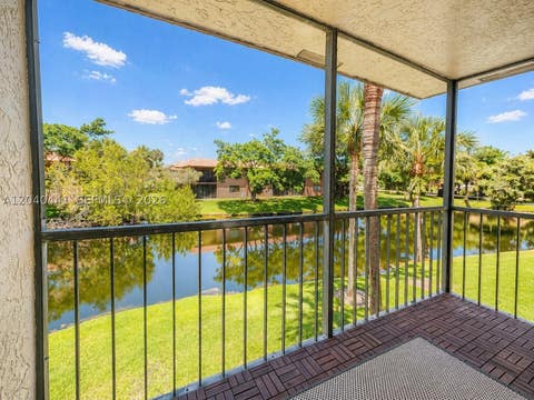 Photo of 305 Lakeview Dr #204, Weston, FL 33326 (MLS # A12040441)