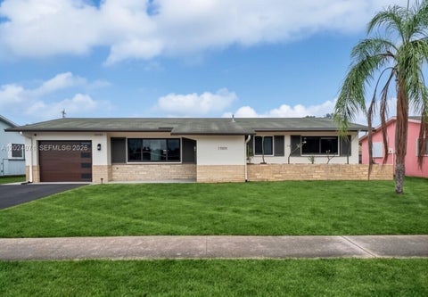 Photo of 11901 NW 23rd St, Pembroke Pines, FL 33026 (MLS # A12024071)