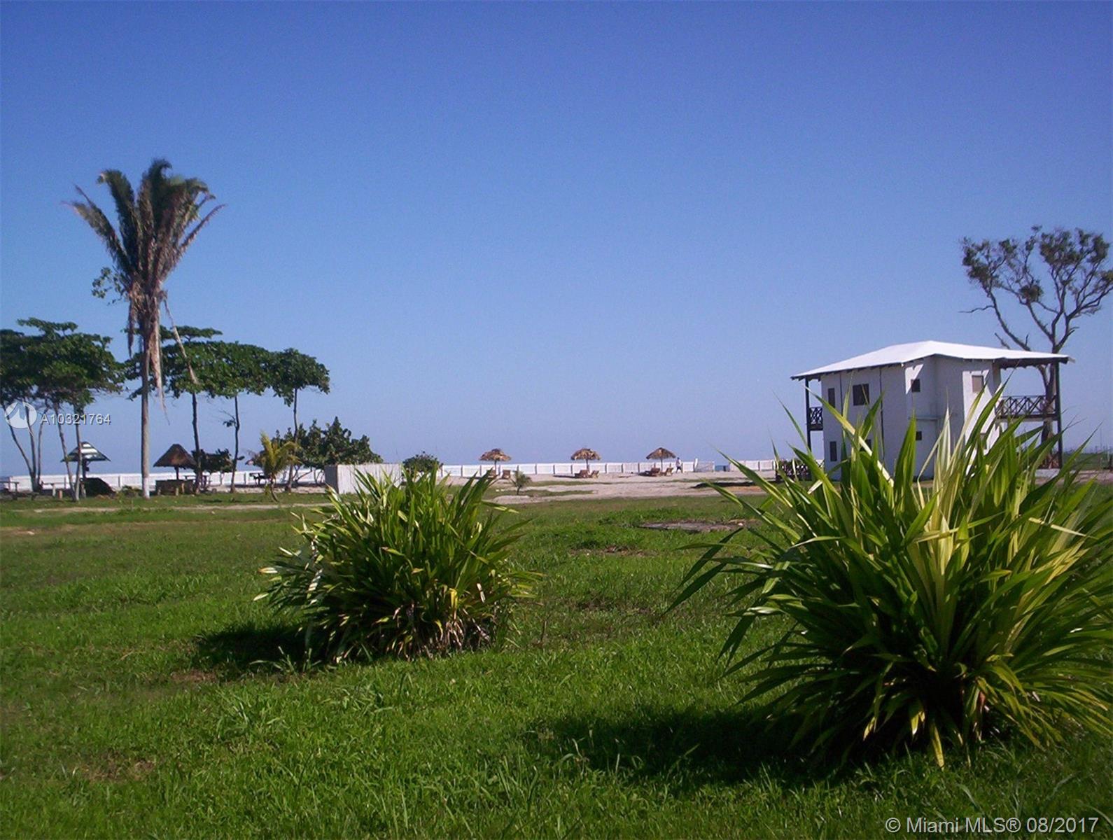 Oceanfront Resort and tennis club in La Ceiba, HONDURAS for sale with land that includes 157 sq meters of beach. Sale includes land, 2 story house with 2,583 sq ft with three balconies that have ocean and mountain views. Includes 4 bungalows of 1100 sq ft each with ocean views, includes 2 bungalows of 688 sq ft with ocean views, clubhouse, 6 tennis courts, artificial lake and more! Excellent investment opportunity. Property is located 2 KM from the international airport. Land holds special licensing for hotel and casino use.