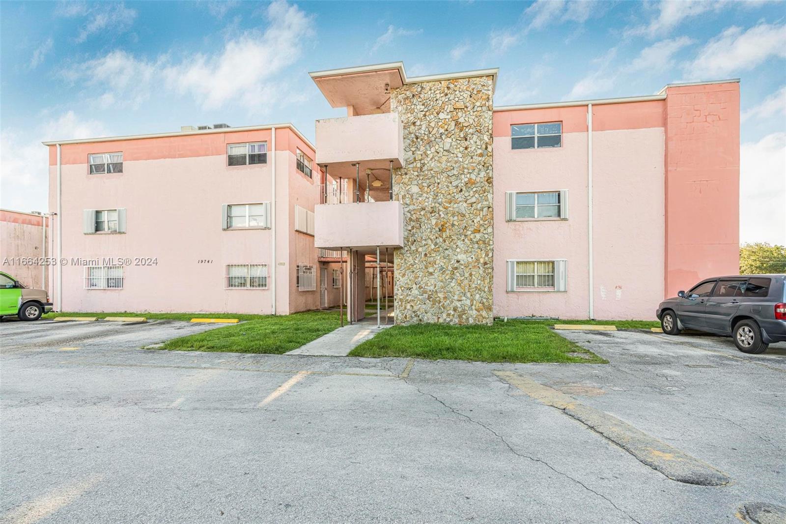 This spacious condo unit, located in a gated community in the heart of Cutler, is well-maintained. It boasts 2 bedrooms and 2 bathrooms, with an open layout interior and a balcony. The unit is move-in ready, featuring tile floors throughout. Appliances such as refrigerator, stove, dishwasher, washer, and dryer are included. The quiet neighborhood also offers a pool.