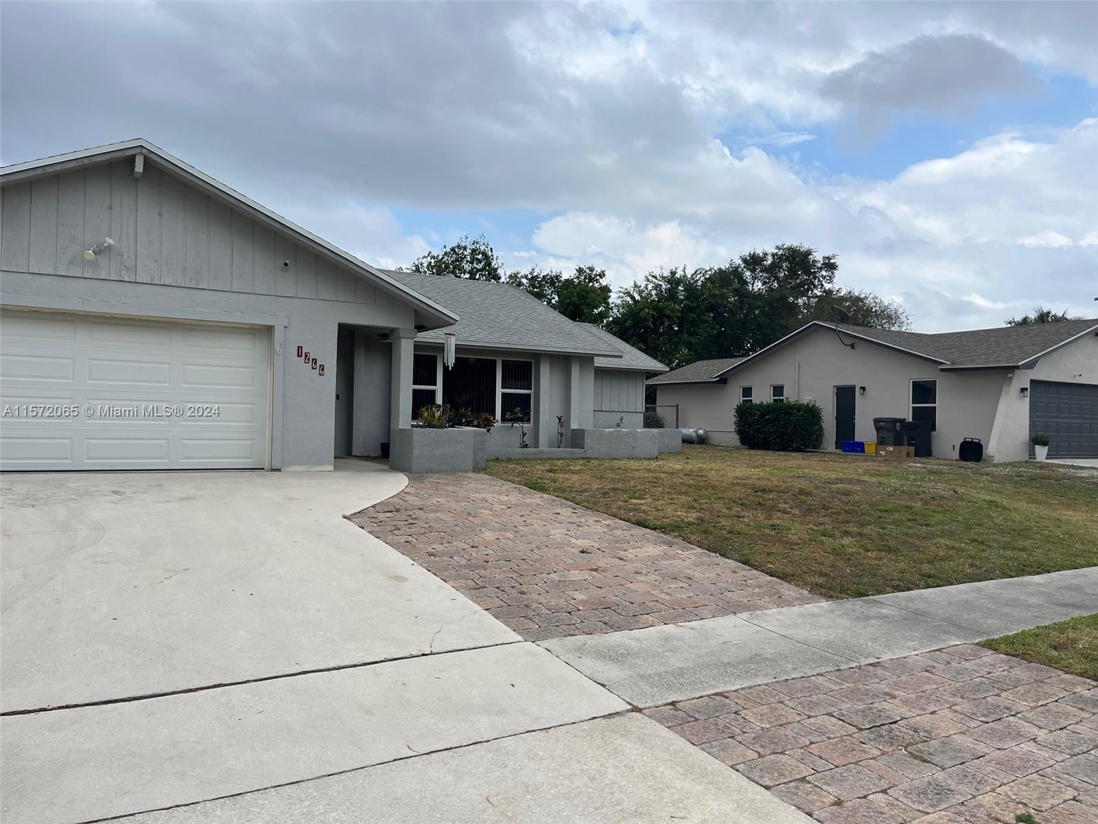 Property for Sale at 1266 E Westchester Dr E Dr, West Palm Beach, Palm Beach County, Florida - Bedrooms: 3 
Bathrooms: 2  - $499,000