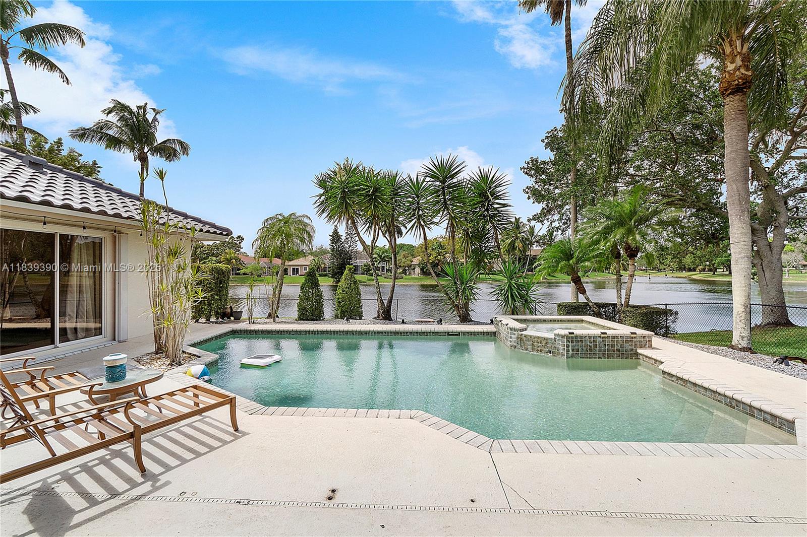 Lake views, a private pool, and room for the whole family - this 5-bedroom home in The Landings of Parkland has it all. Featuring an open-concept kitchen, oversized master with pool and deck access, split floor plan, and 3-car garage. Enjoy peaceful mornings by the lake or take advantage of community tennis courts and lush parks. Located in a quiet, gated neighborhood with A-rated schools. Landscaping and pool maintenance are included. Don’t miss this opportunity - schedule your showing today!