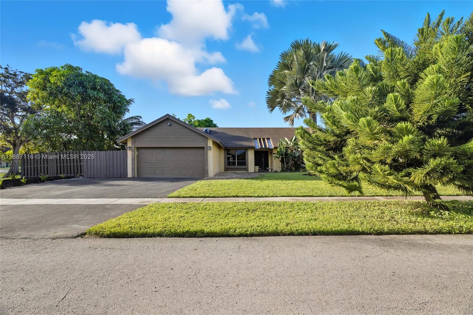 Discover this beautifully maintained single-family home on a spacious fenced corner lot in Lauderhill. Featuring stainless steel appliances, a bright and open layout, and tasteful finishes throughout, this home offers comfort and style with no HOA restrictions. Pride of ownership shines throughout with meticulous care taken inside and out. Enjoy outdoor living with plenty of yard space — perfect for entertaining, pets, or future customization, build your dream pool, create the perfect outdoor oasis. A large enclosed porch is currently under construction and will be completed before closing, adding even more livable space to enjoy. Conveniently located minutes away from Sawgrass Mills Mall, shops, restaurants, schools, and major roadways. Move-in ready and a rare find!
