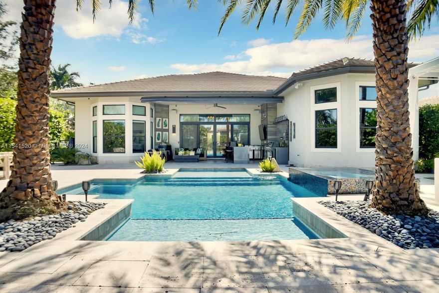 This single story home is the only available Victoria Model in the exclusive community of Seven Bridges. This home is located in the prestigious ''Coastal'' collection and has so many upgrades. Gated entry and double glass doors welcome you into an enormous Foyer with 14ft volume ceilings, central vacuum, interior and exterior security camera system, upgraded air conditioner, water softener system, surround system, kitchen has upgraded appliances Wolf & Subzero, professionally finished closets. This home is Set on a private oversized waterfront lot with almost 14000 sq ft featuring beautiful lake views. It has an outdoor summer kitchen with grills, refrigerators and more, gorgeous heated pool. The front and backyard are professionally landscaped. ***As per Seller Price is Firm***