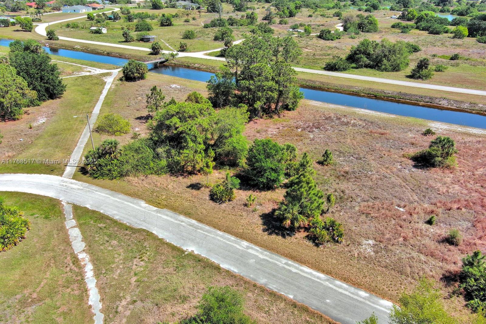 Exclusively presented by Sunland Real Estate: Prime .31 acre waterfront residential lot in a very good location close to everything. Close to Homestead road that takes you to Lee Boulevard where all shopping and amenities are. This lot is unique because it is surrounded by green space that is walk able. This lot is ready for development. Sitting high and dry, this lot offers an excellent opportunity to build in one of Southwest Florida’s fastest-growing communities. Lehigh Acres is known for its affordable land, friendly neighborhoods, and convenient access to Fort Myers. Just a short drive from shopping, dining, and the breathtaking Gulf Coast beaches, this property offers an excellent opportunity to develop your next project in a thriving and fast-growing community.