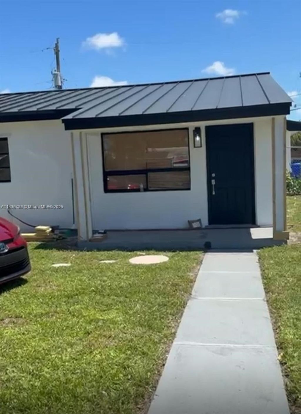 Photo of 5666 Mayo St #3, Hollywood, FL 33023 (MLS # A11836423)