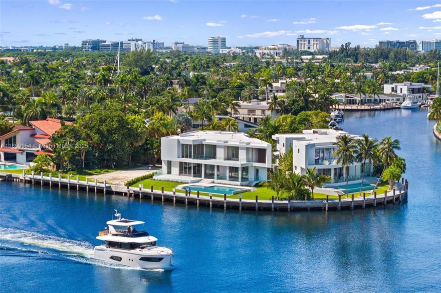 Introducing 503 Palm Drive — a Brand New waterfront masterpiece just 30 days from completion! Located within the prestigious guard-gated community of Golden Isles in Hallandale Beach, this striking estate is perfectly set on the direct Intracoastal, boasting 135 FT of prime water frontage on an oversized 15,000 SF lot. Interiors span 7,250 SF with 7 bedrooms, an office, and 8.5 bathrooms, all designed with meticulous attention to detail. Step inside to experience custom millwork, bespoke finishes, and top-tier materials that define contemporary coastal elegance. Enjoy a European-style kitchen, private elevator, and seamless indoor-outdoor living with a resort-style pool, summer kitchen, new concrete seawall providing direct ocean access on no-wake zone. Interior Photos Coming Soon!!!