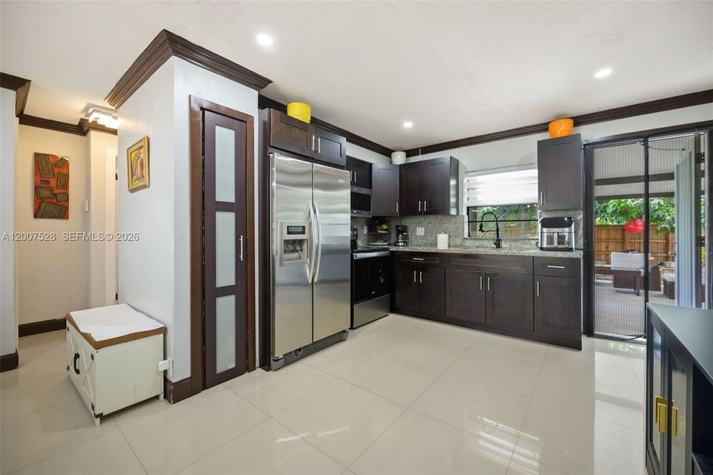 Photo of 6870 Thomas St, Hollywood, FL 33024 (MLS # A12007528)