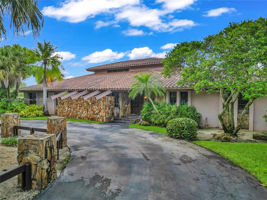 This outstanding equestrian property sits on a sprawling 4.38 Acre lot. It's well-designed barn w/7 stalls & air-conditioned office, 10 grass paddocks, large riding ring & ample pasture for grazing make this the perfect haven for you & your equine companions. The spacious home boasts 5,165 sq ft. w/unique spaces thoughtfully built to create an inviting atmosphere. The grand formal room w/bar & fireplace provide a sophisticated ambiance. The covered patio opens to an expansive pool deck providing space for outdoor relaxation. Every aspect of this residence speaks to the passion and dedication of its one and only original owners, their thoughtful design choices make this home an exceptional canvas for your unique touch. Agricultural tax exemption and income producing opportunity available!