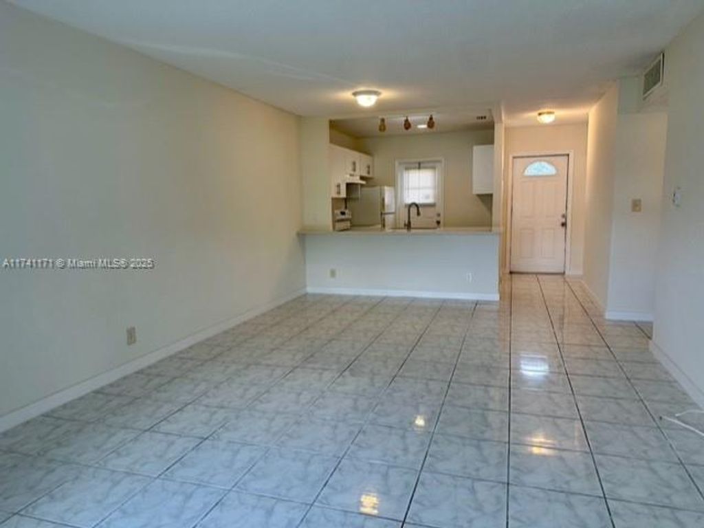 Photo of 5001 W Oakland Park Blvd #109, Lauderdale Lakes, FL 33313 (MLS # A11741171)
