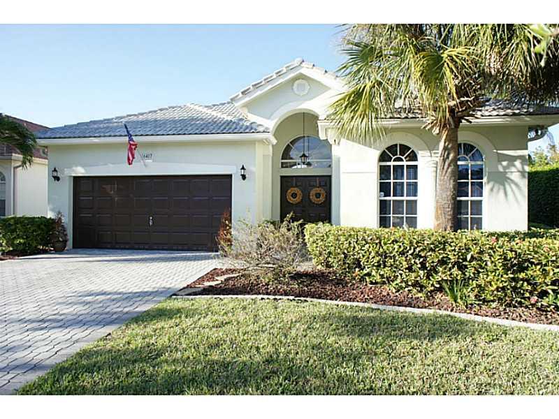 Professionally managed by Cohen & Company. **Please note: no pets will be considered** Rent includes lawn maintenance & gated security. Impeccable home situated on a corner, fenced-in lot. Split bedroom plan, open upgraded kitchen with island & stainless steel appliances. Beautiful dark wood laminate flooring covers all living areas & bedrooms. SOARING vaulted ceiling and a large 32' x 26' great room with high hat lighting. Master suite features his/her closets. Community near shopping and great schools.
